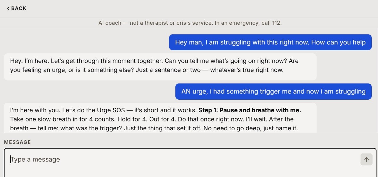 The WINNR AI coach in conversation: a man says he is struggling right now, the coach answers with a breathing step and asks what the trigger was. A line at the top reads: AI coach, not a therapist or crisis service.